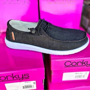 Black Slide-on Kayak sneakers by Corkys